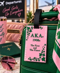 AKA First and the Finest Luggage Tag (Pink) on green luggage